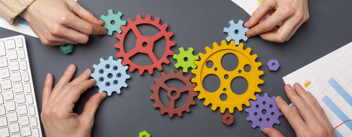 still-life-business-roles-with-various-mechanism-pieces-1140x445